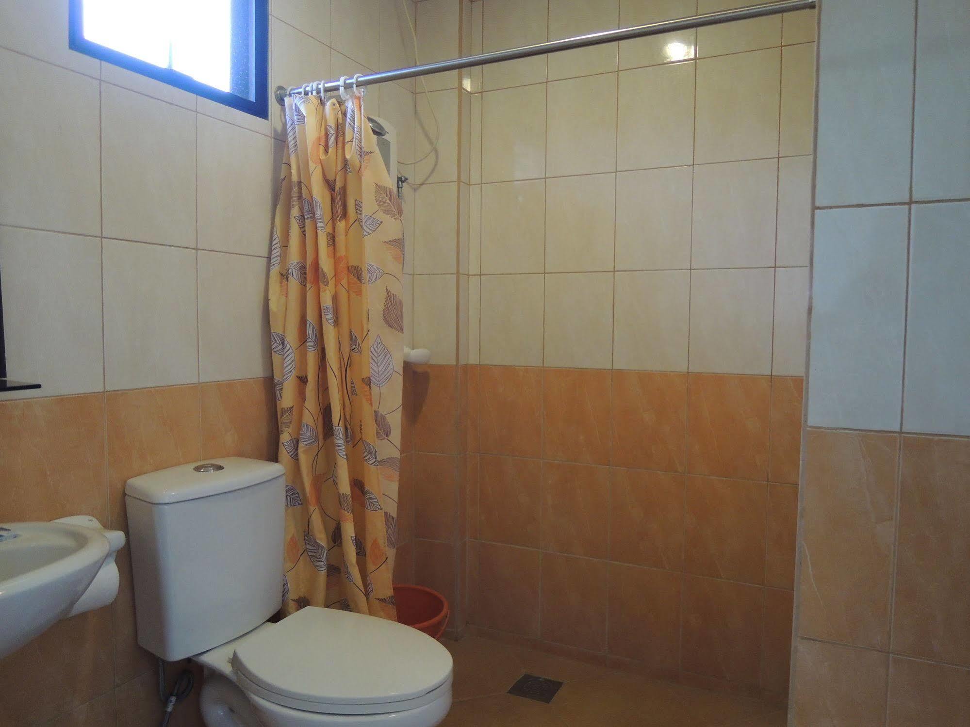 Palms Seaside Inn And Resort Medellin Екстериор снимка