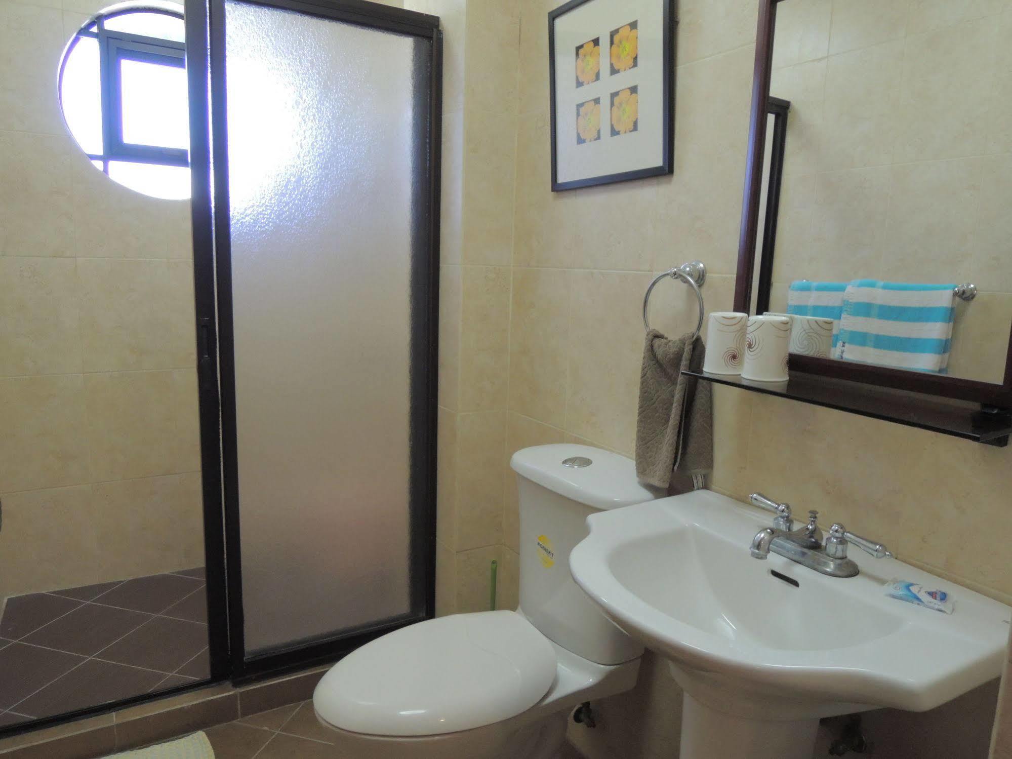 Palms Seaside Inn And Resort Medellin Екстериор снимка