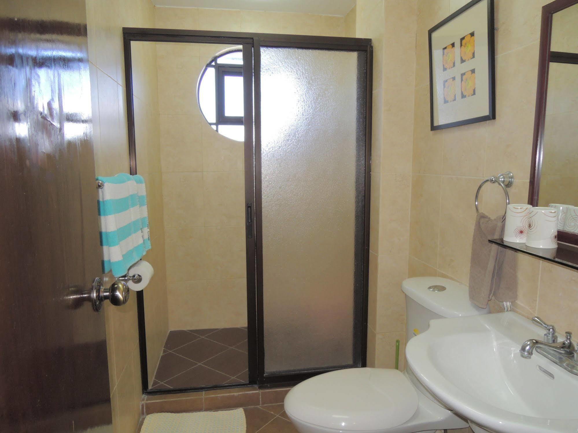 Palms Seaside Inn And Resort Medellin Екстериор снимка