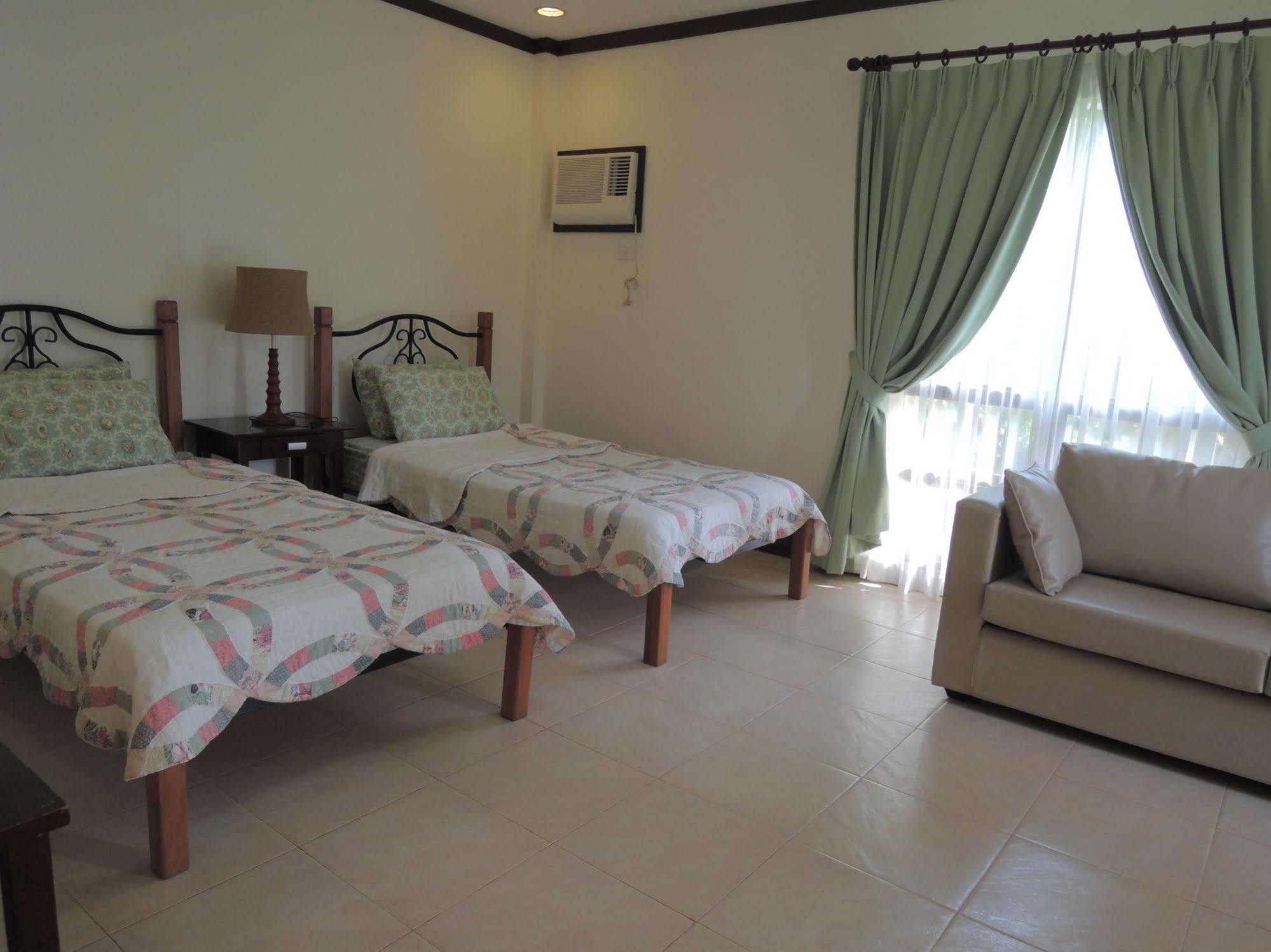 Palms Seaside Inn And Resort Medellin Екстериор снимка