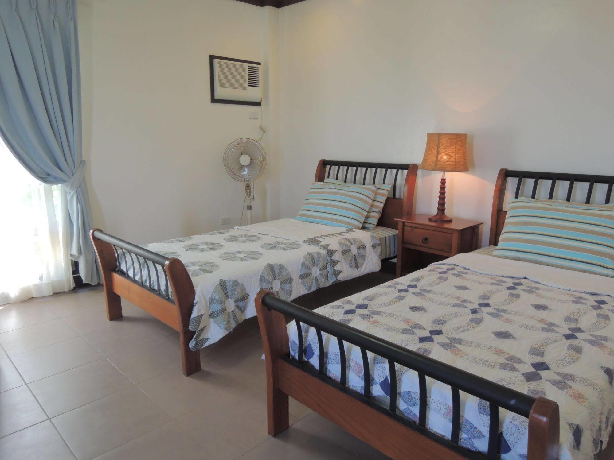 Palms Seaside Inn And Resort Medellin Екстериор снимка