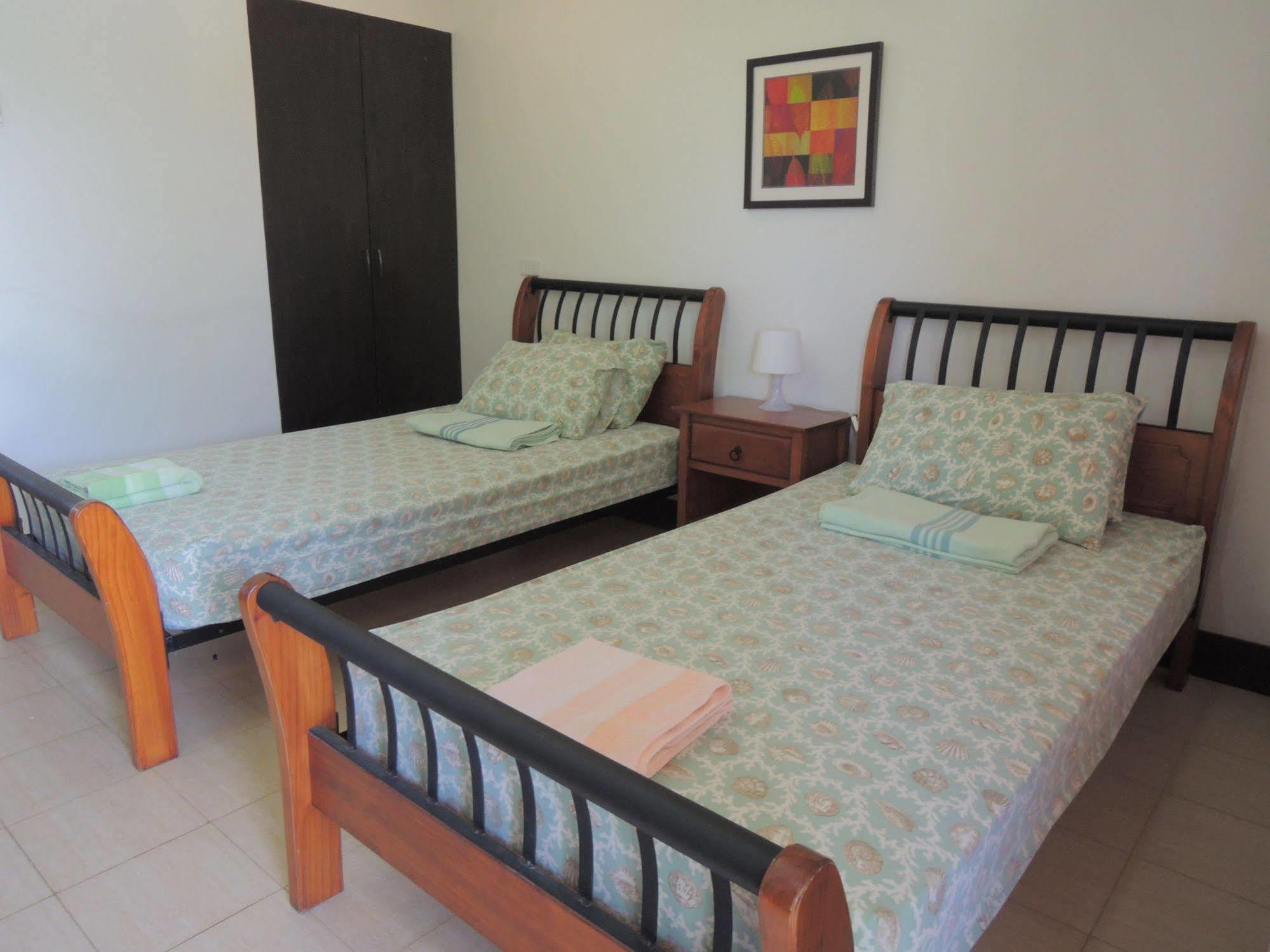 Palms Seaside Inn And Resort Medellin Екстериор снимка