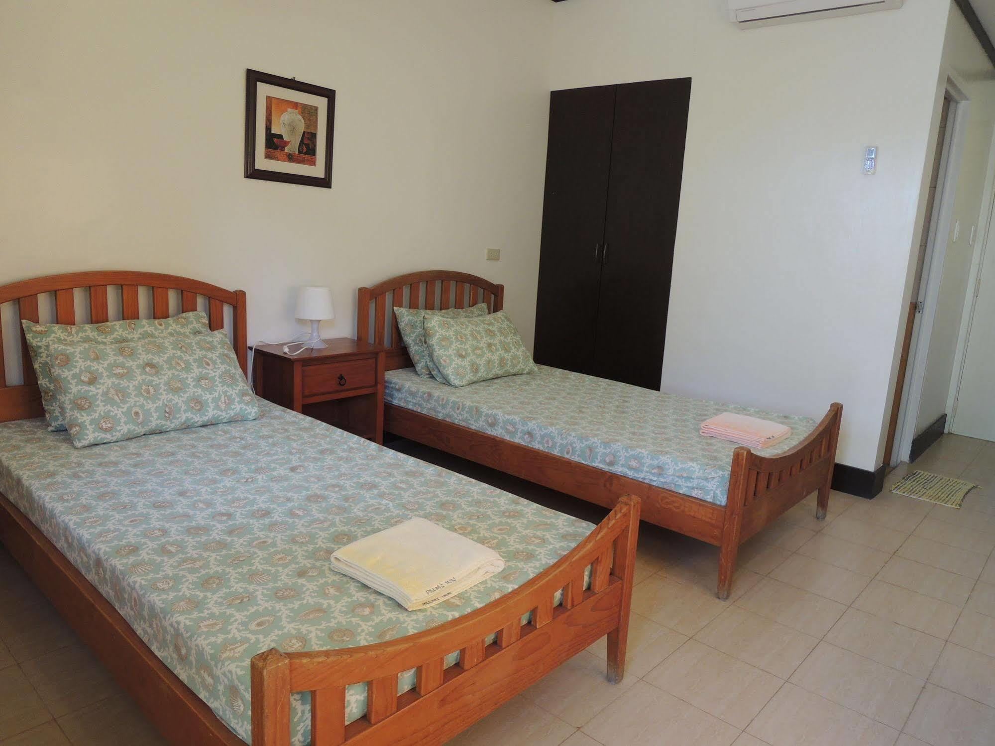 Palms Seaside Inn And Resort Medellin Екстериор снимка