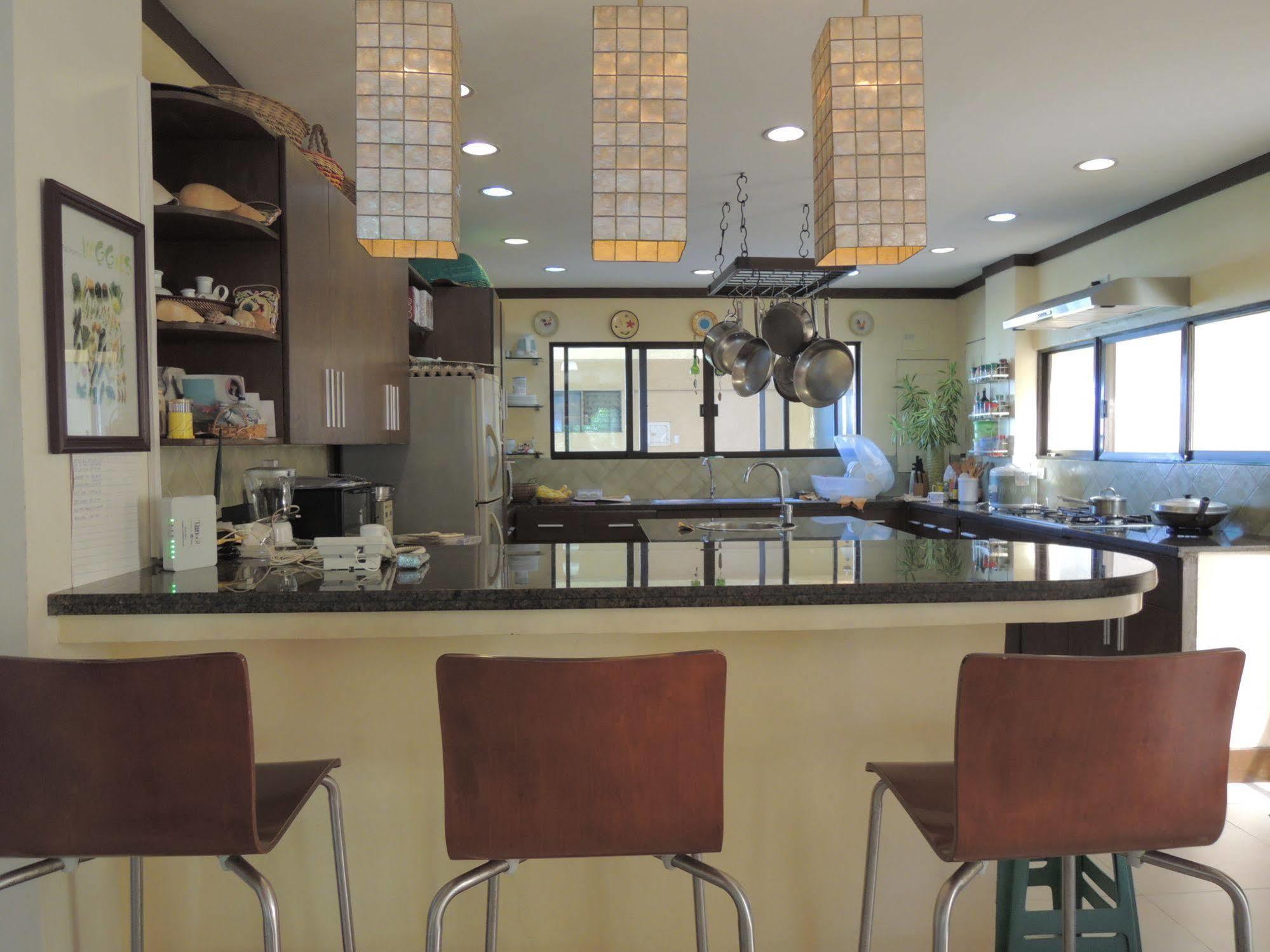 Palms Seaside Inn And Resort Medellin Екстериор снимка