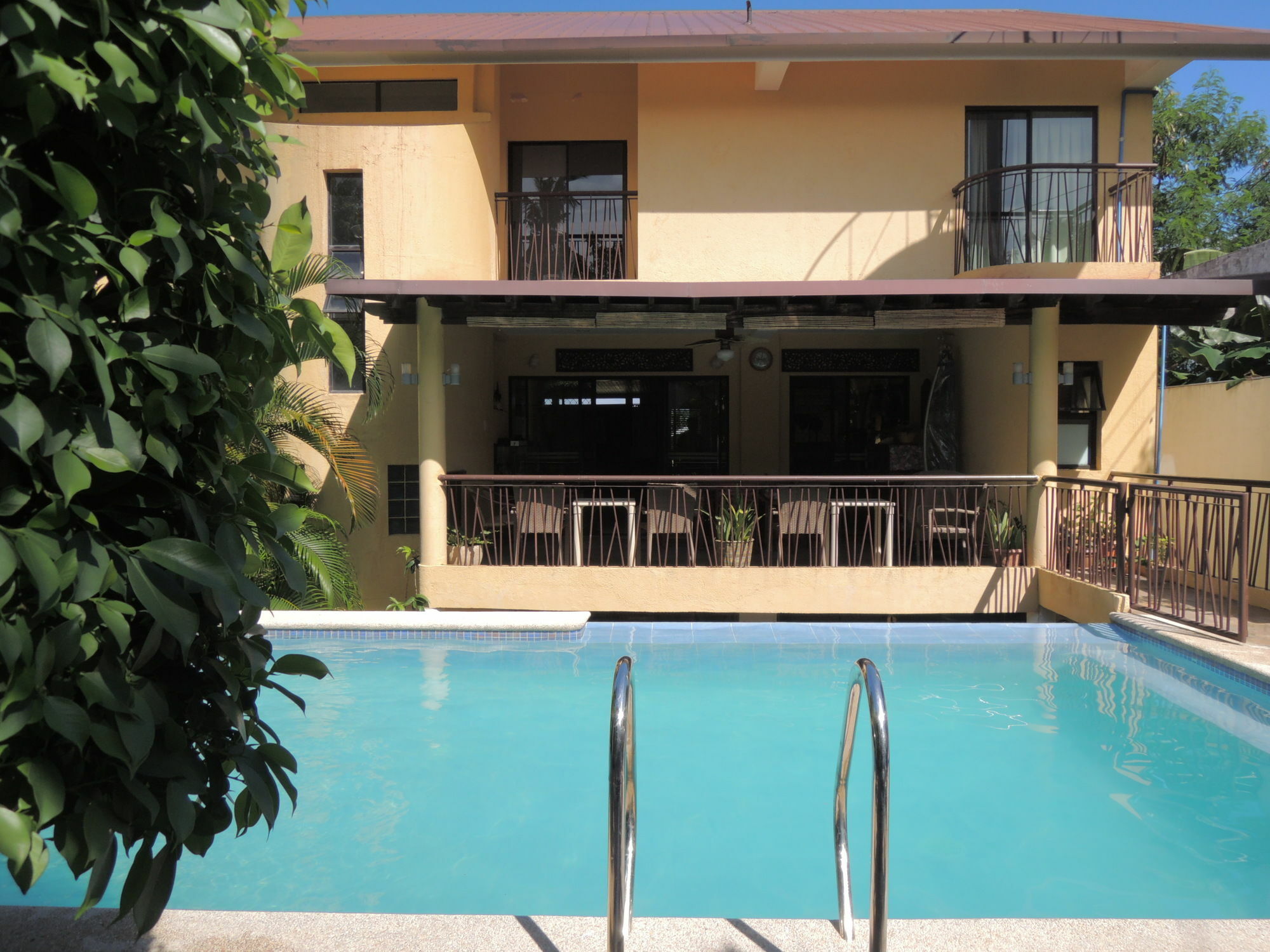 Palms Seaside Inn And Resort Medellin Екстериор снимка